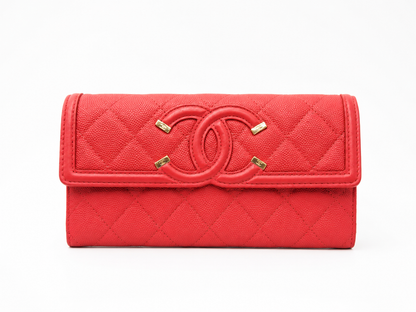CHANEL Caviar Quilted Large Filigree Gusset Flap Wallet in Red