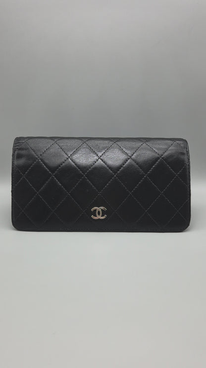 CHANEL Lambskin Quilted Yen Wallet in Black