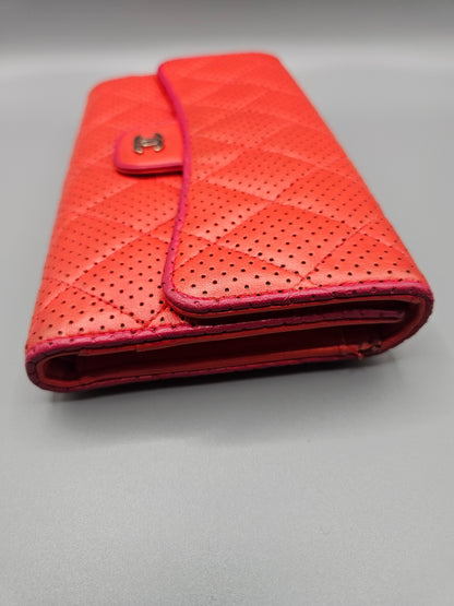 CHANEL Quilted Perforated Leather Wallet in Coral Red