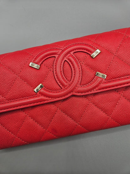 CHANEL Caviar Quilted Large Filigree Gusset Flap Wallet in Red