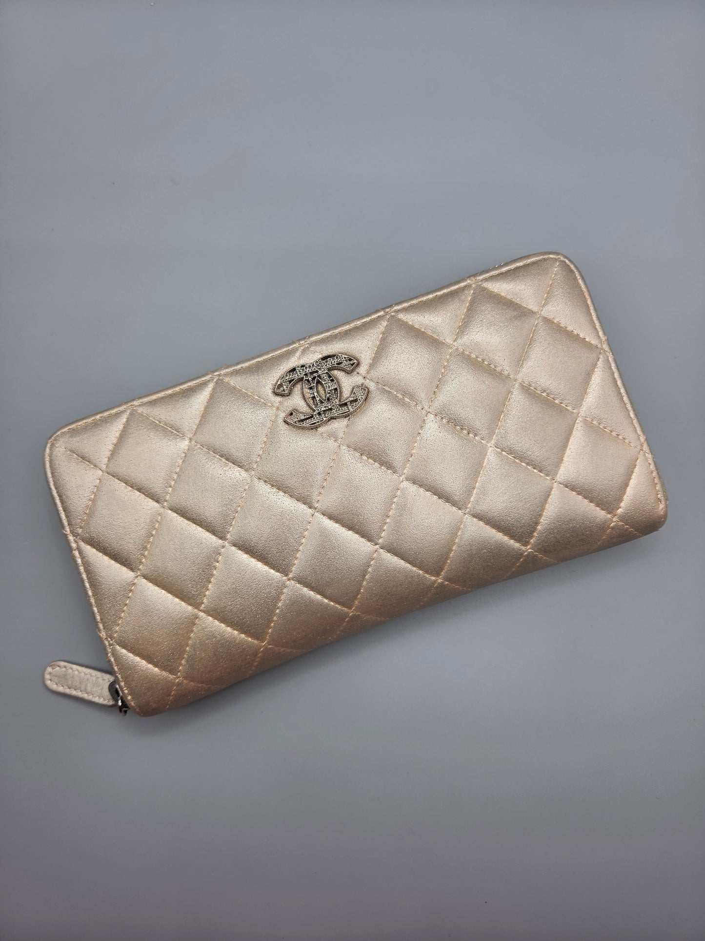 CHANEL Gold Quilted Leather Zip-Around Wallet