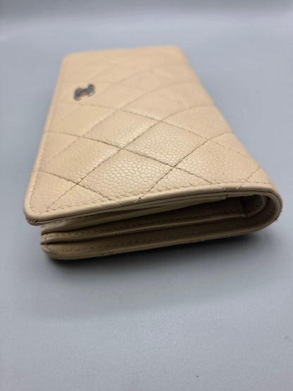 CHANEL Beige Quilted Leather Yen Wallet in Tan