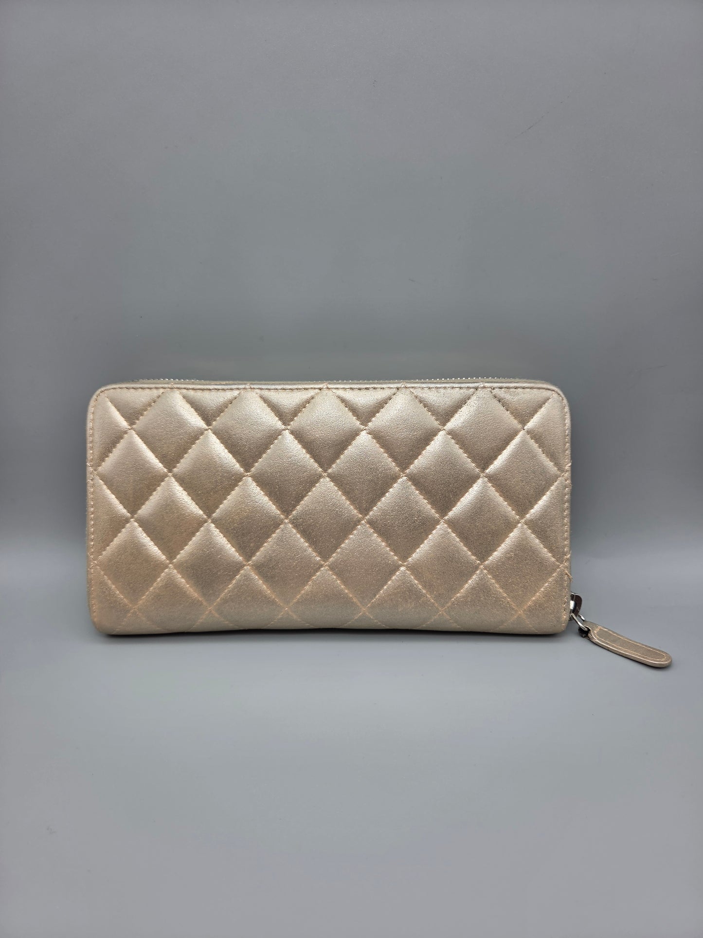 CHANEL Gold Quilted Leather Zip-Around Wallet