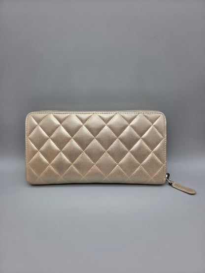 CHANEL Gold Quilted Leather Zip-Around Wallet