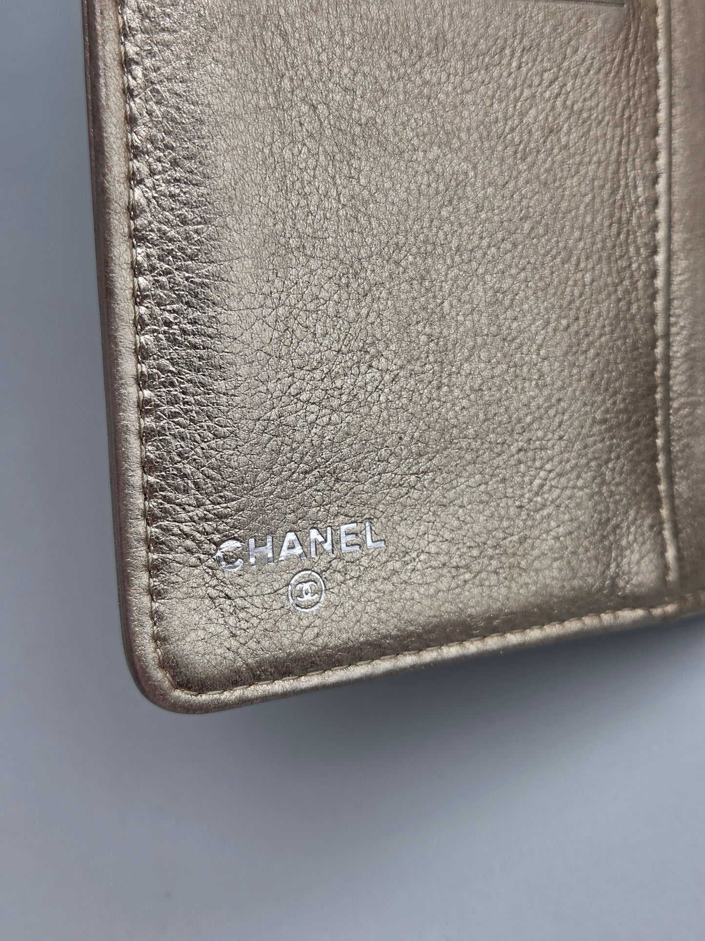 CHANEL Metallic Lambskin Quilted Boy Yen Wallet