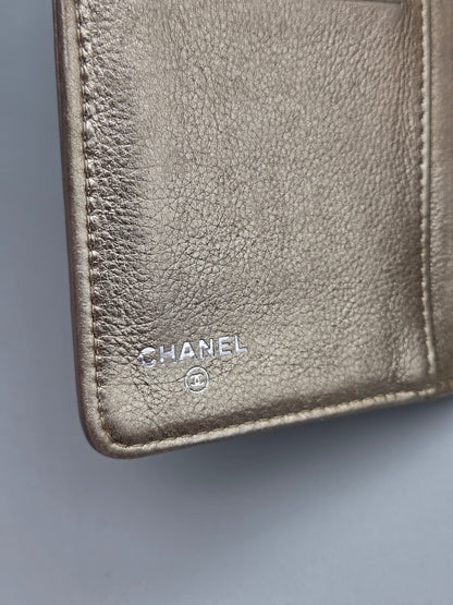 CHANEL Metallic Lambskin Quilted Boy Yen Wallet