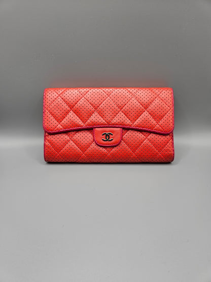 CHANEL Quilted Perforated Leather Wallet in Coral Red