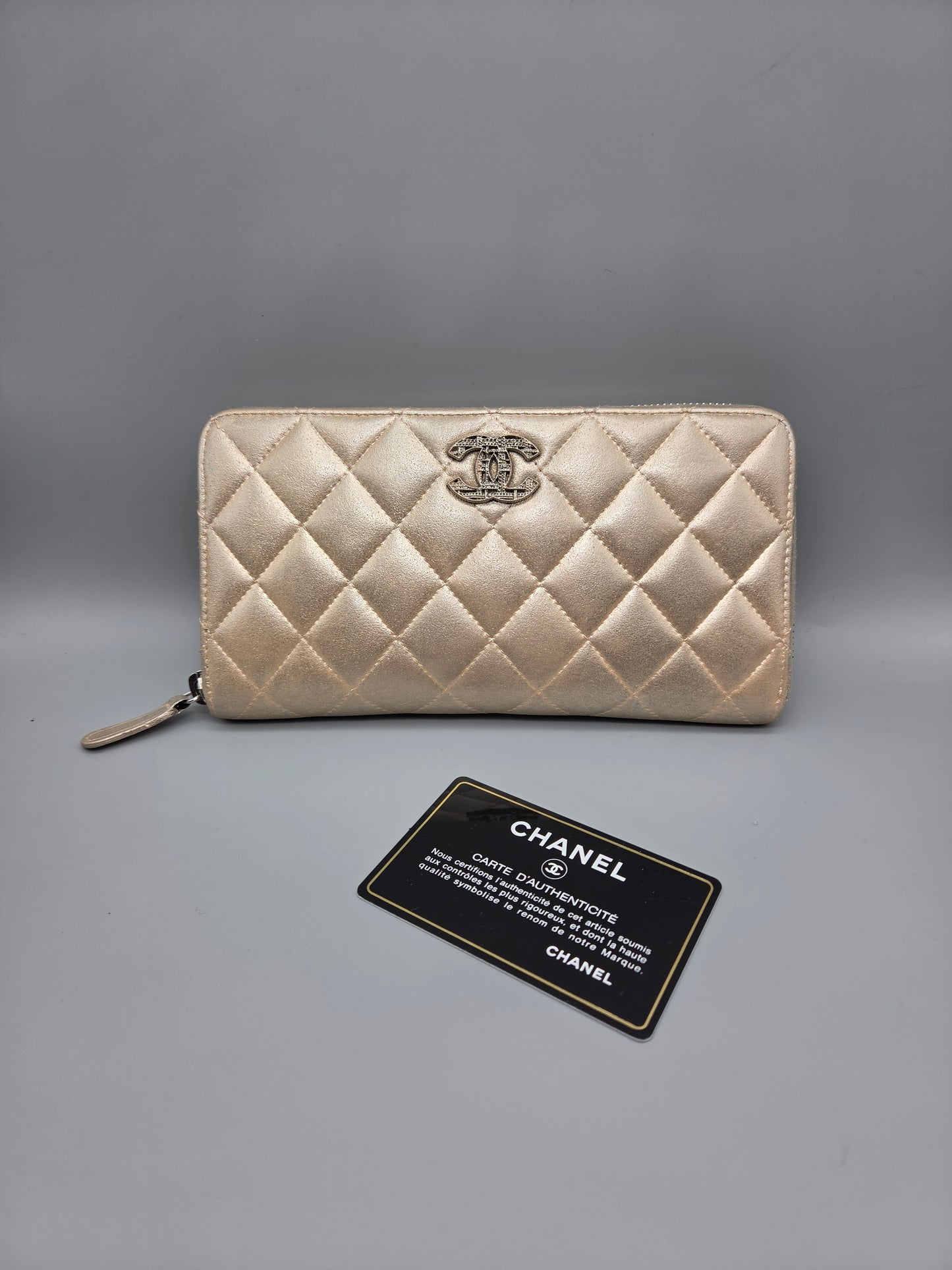 CHANEL Gold Quilted Leather Zip-Around Wallet