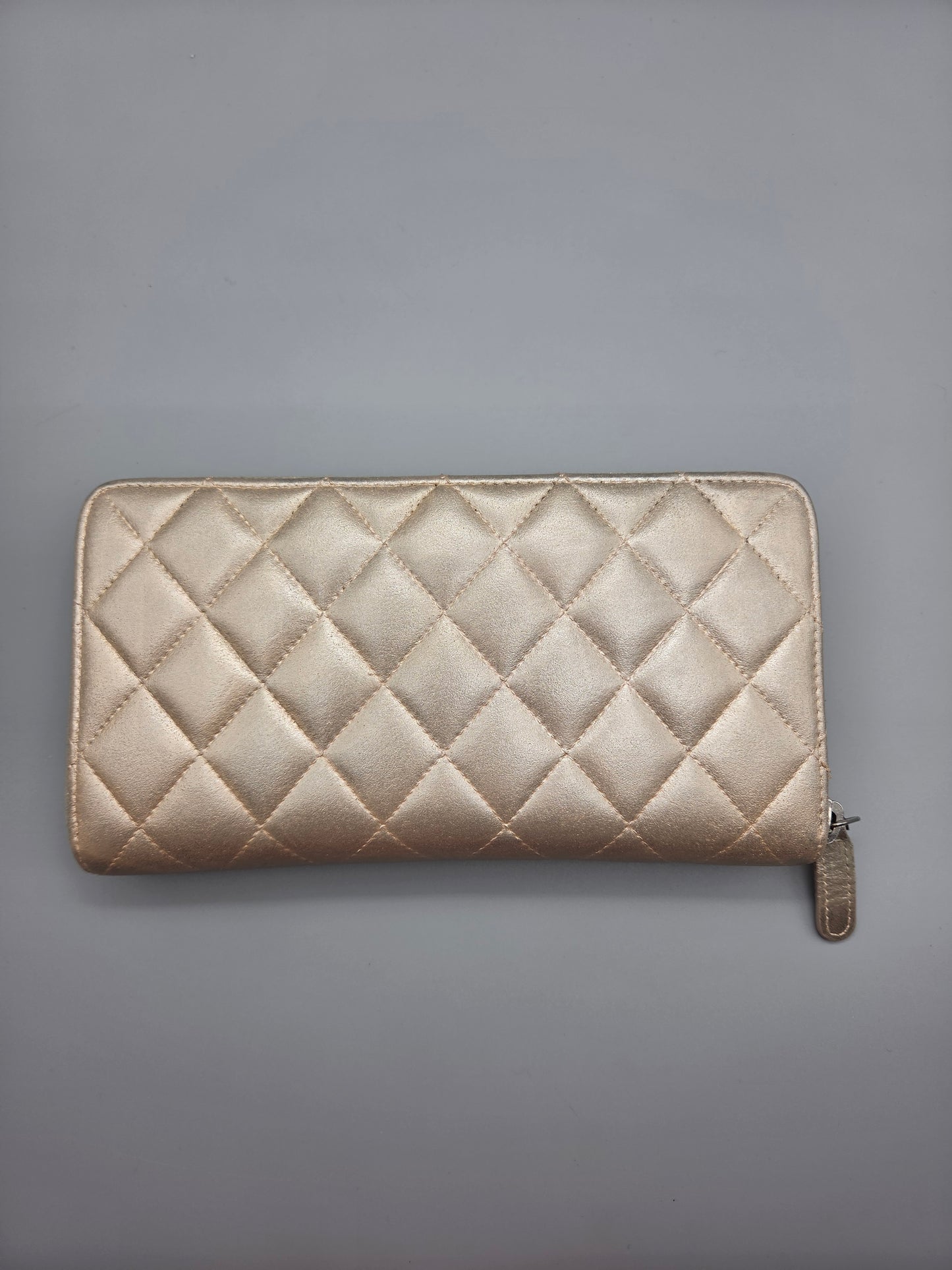 CHANEL Gold Quilted Leather Zip-Around Wallet