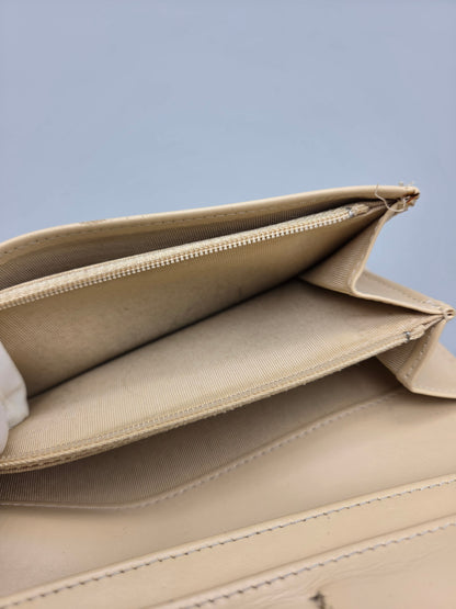 CHANEL Beige Quilted Leather Yen Wallet in Tan