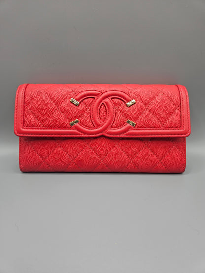 CHANEL Caviar Quilted Large Filigree Gusset Flap Wallet in Red