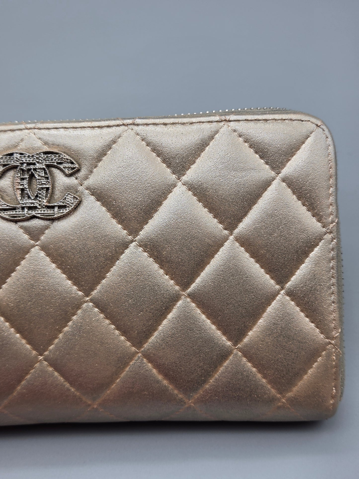 CHANEL Gold Quilted Leather Zip-Around Wallet