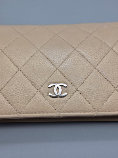 CHANEL Beige Quilted Leather Yen Wallet in Tan