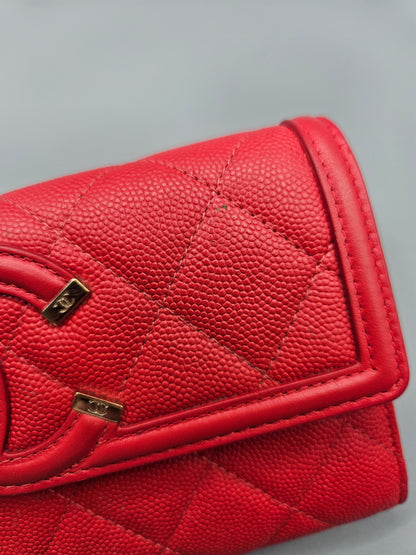 CHANEL Caviar Quilted Large Filigree Gusset Flap Wallet in Red