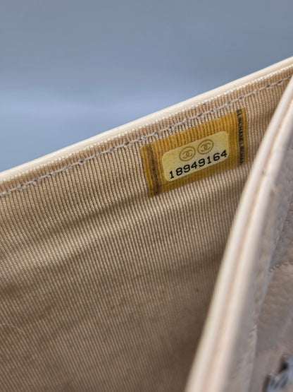 CHANEL Beige Quilted Leather Yen Wallet in Tan