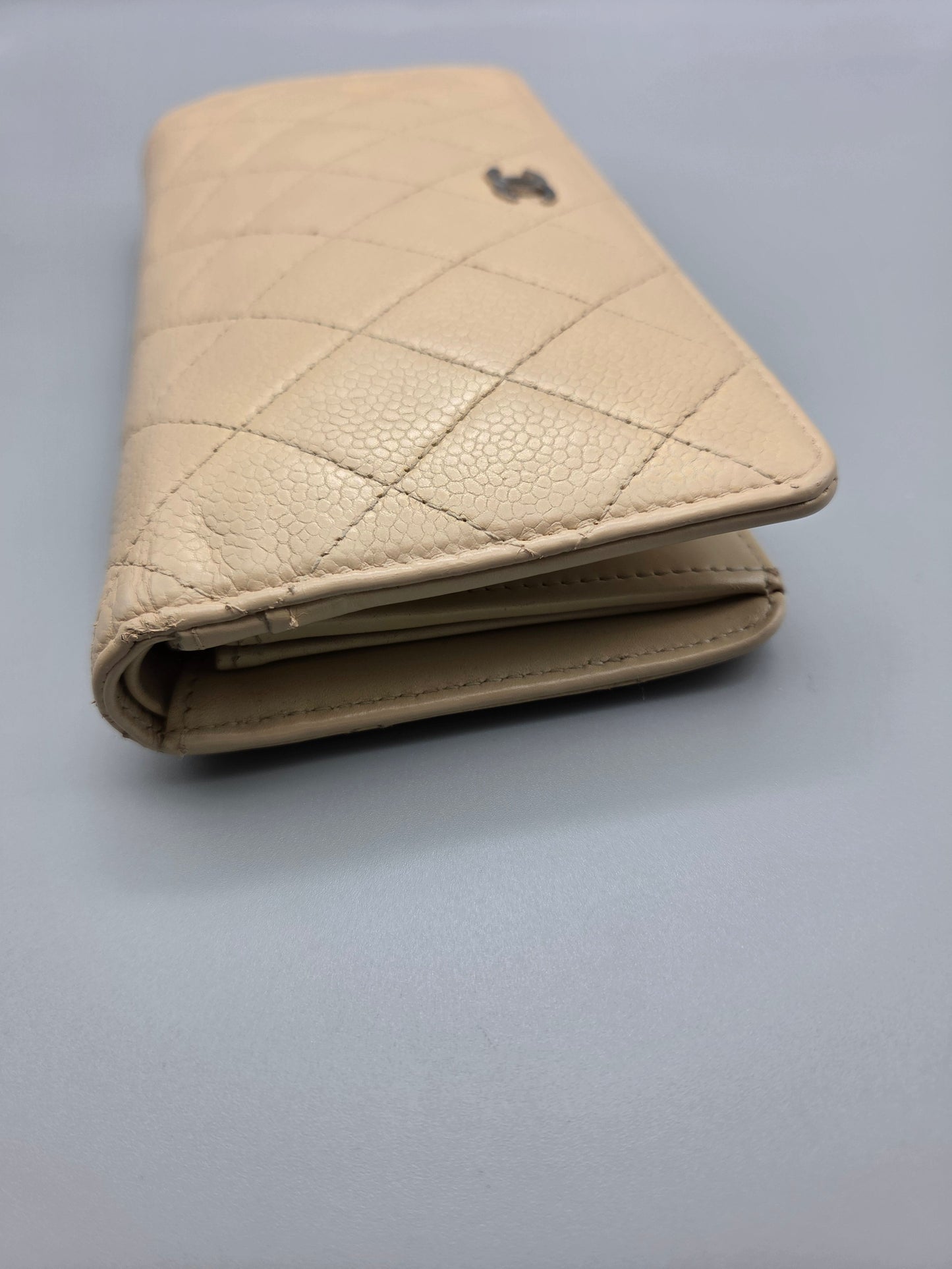 CHANEL Beige Quilted Leather Yen Wallet in Tan
