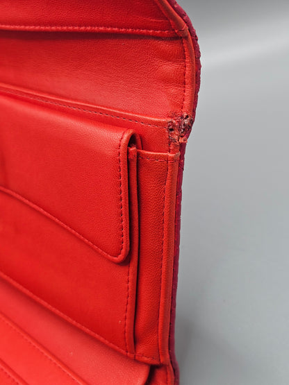 CHANEL Quilted Perforated Leather Wallet in Coral Red