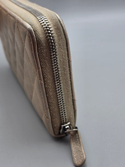 CHANEL Gold Quilted Leather Zip-Around Wallet