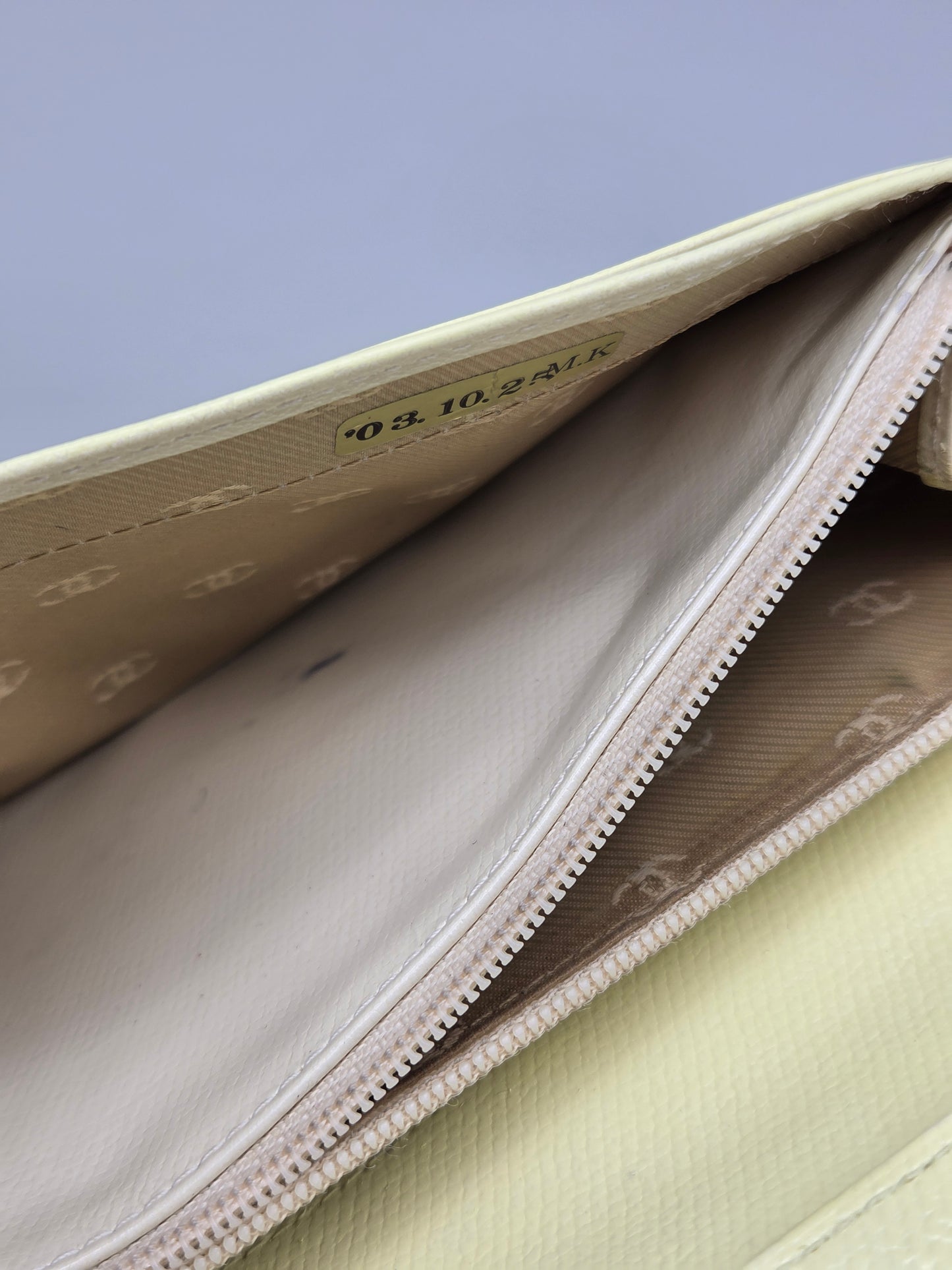Grained Calfskin CC Button Yen Clutch Wallet in Pale Yellow