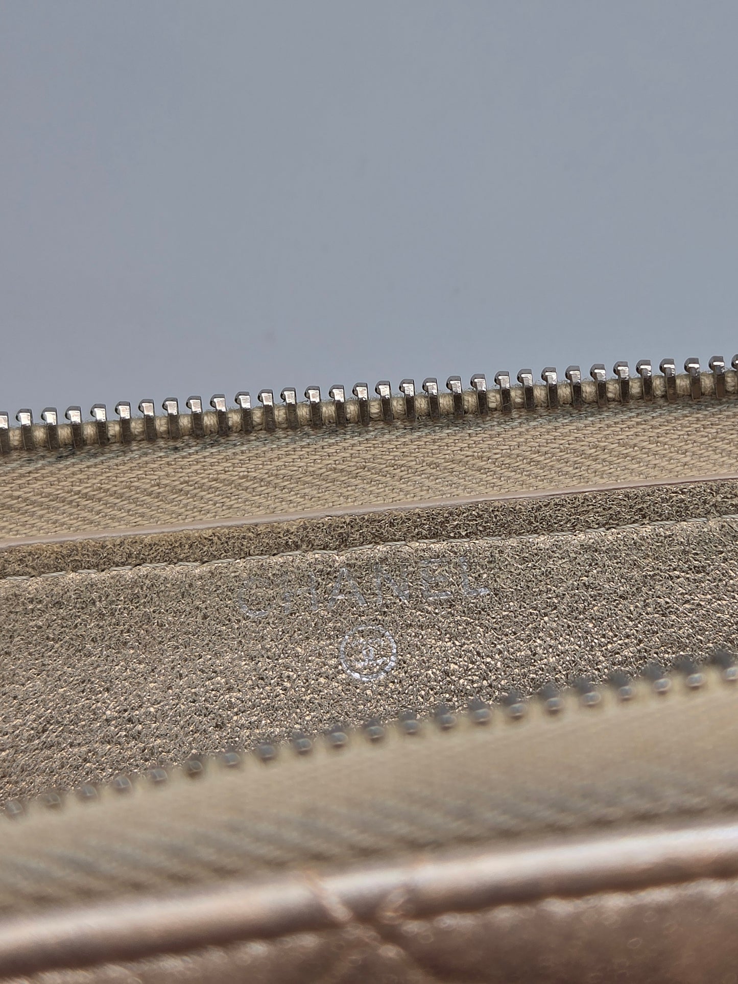 CHANEL Gold Quilted Leather Zip-Around Wallet