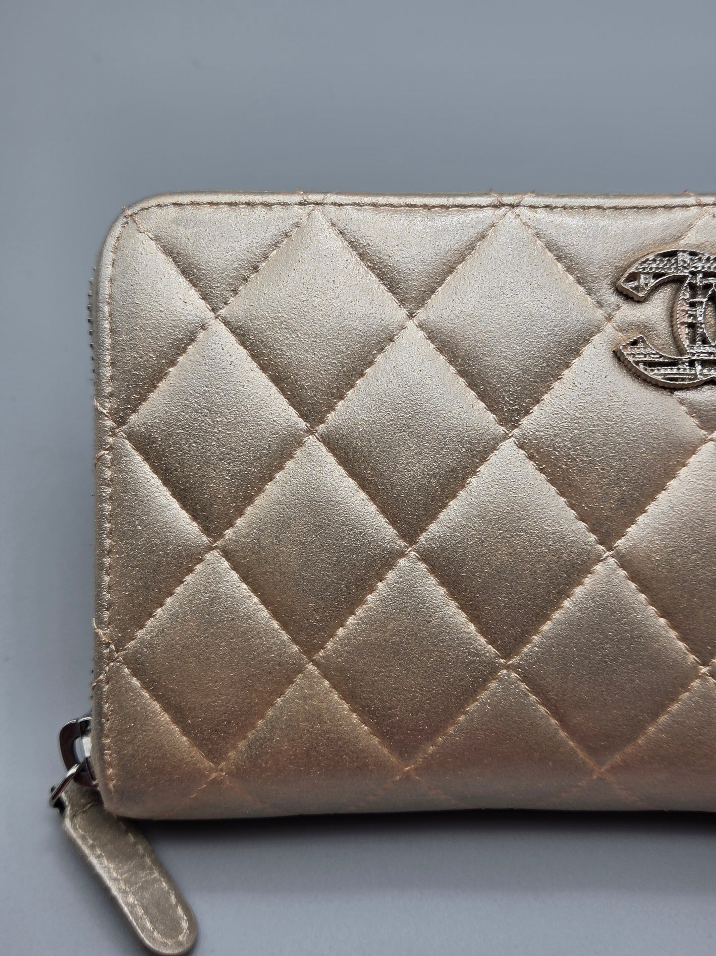 CHANEL Gold Quilted Leather Zip-Around Wallet
