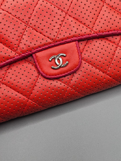 CHANEL Quilted Perforated Leather Wallet in Coral Red