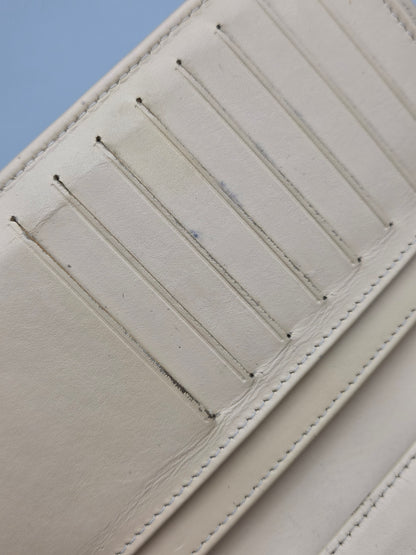 CHANEL Beige Quilted Leather Yen Wallet in Tan