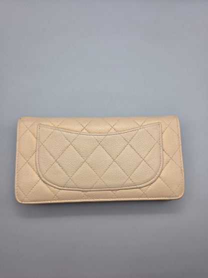 CHANEL Beige Quilted Leather Yen Wallet in Tan