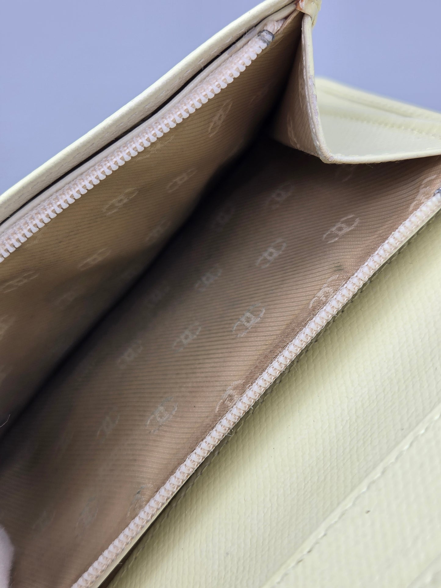 Grained Calfskin CC Button Yen Clutch Wallet in Pale Yellow