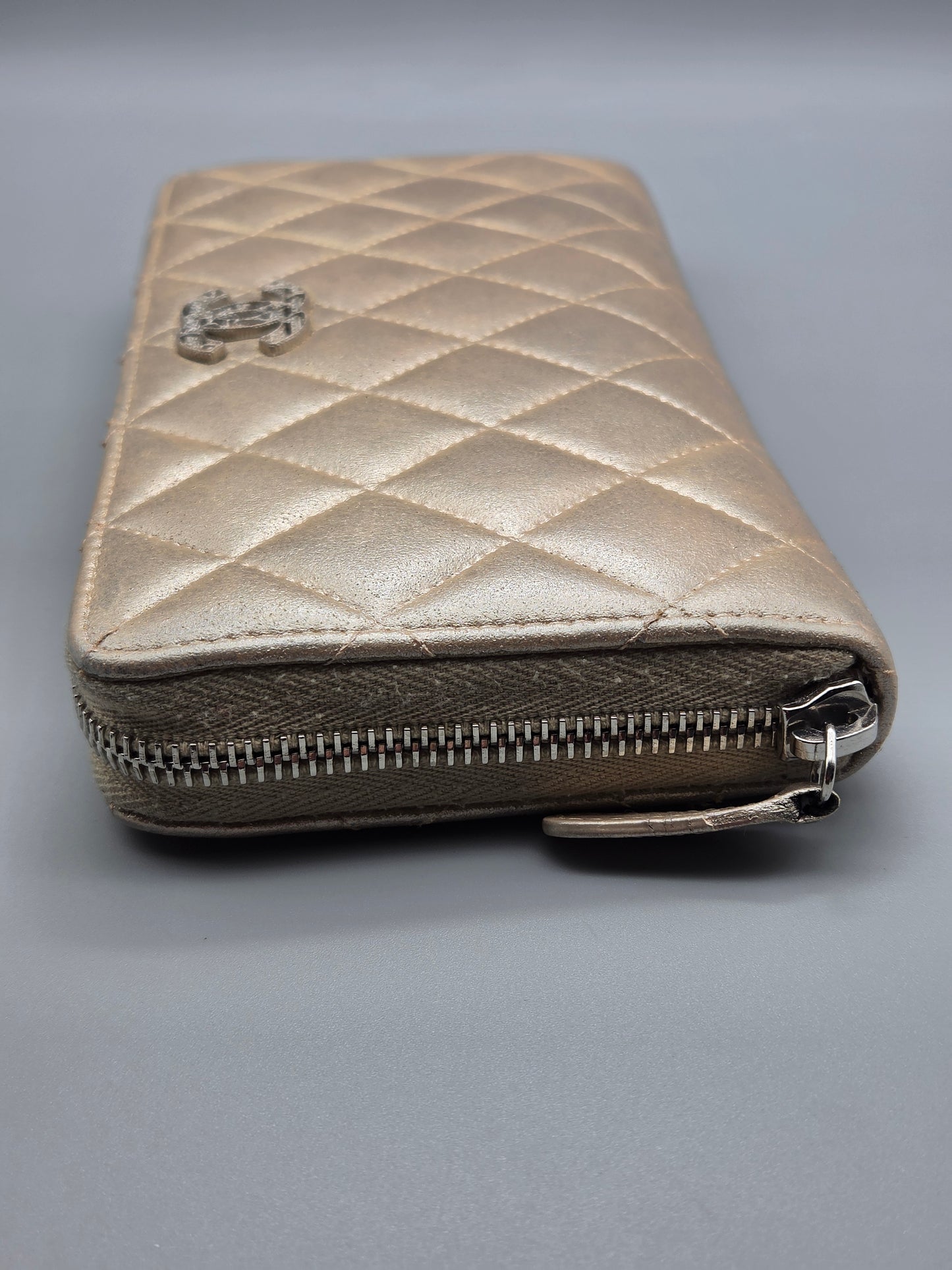 CHANEL Gold Quilted Leather Zip-Around Wallet