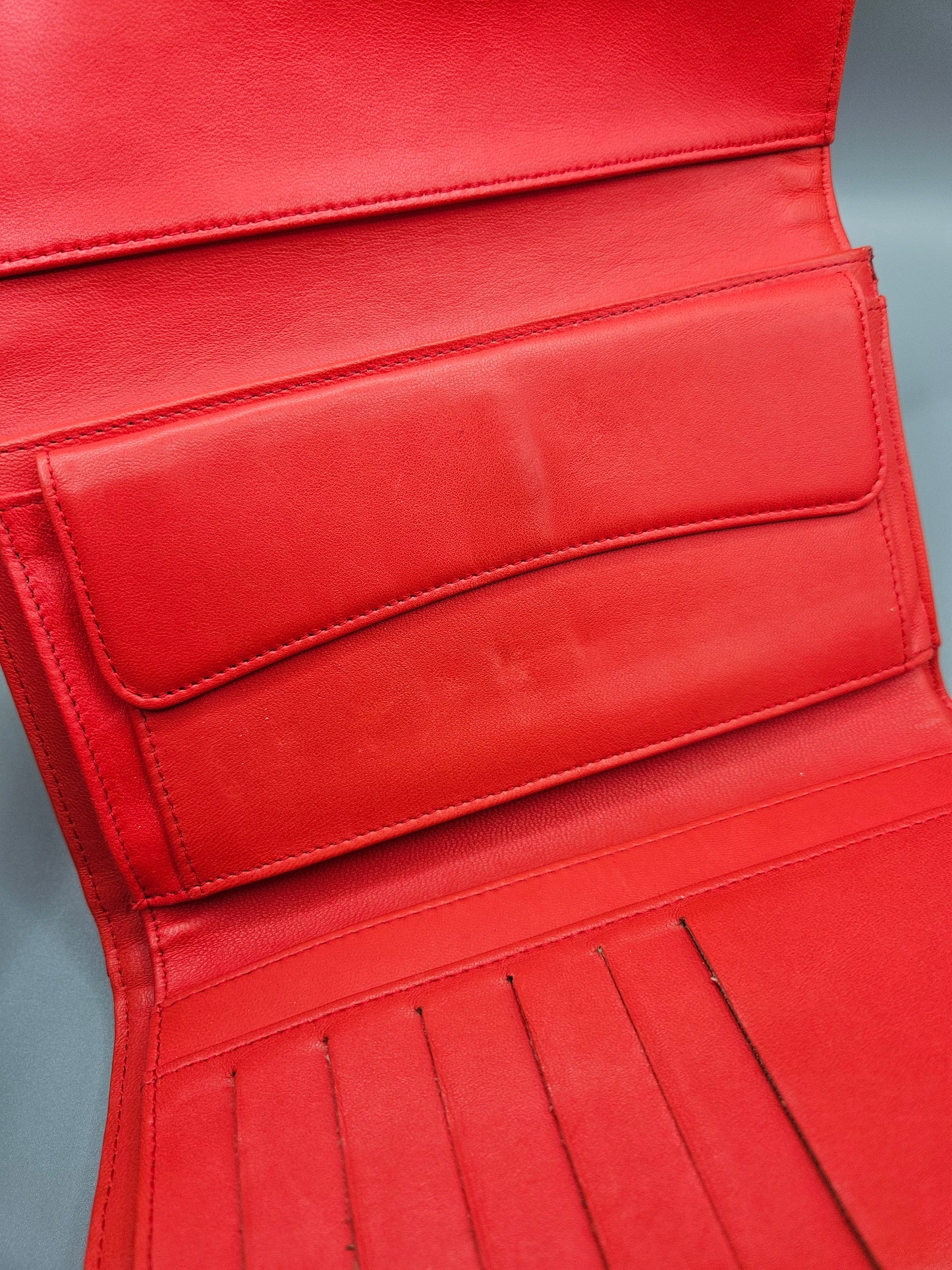 CHANEL Quilted Perforated Leather Wallet in Coral Red