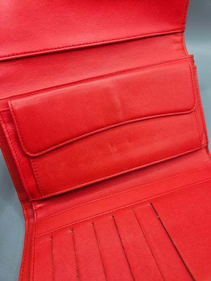 CHANEL Quilted Perforated Leather Wallet in Coral Red