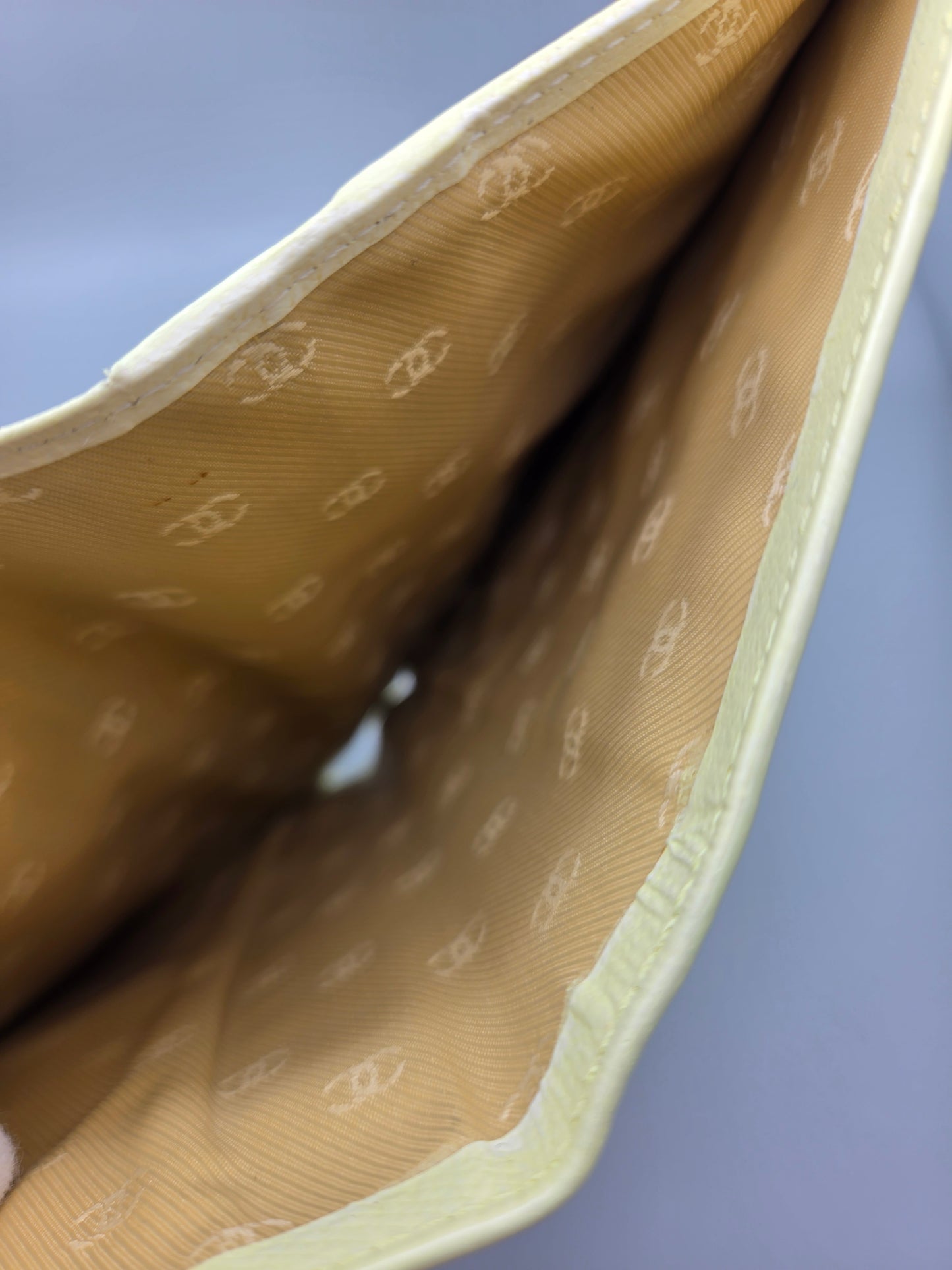 Grained Calfskin CC Button Yen Clutch Wallet in Pale Yellow